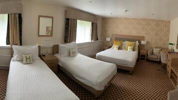 Family Room | Desk, laptop workspace, blackout curtains, iron/ironing board