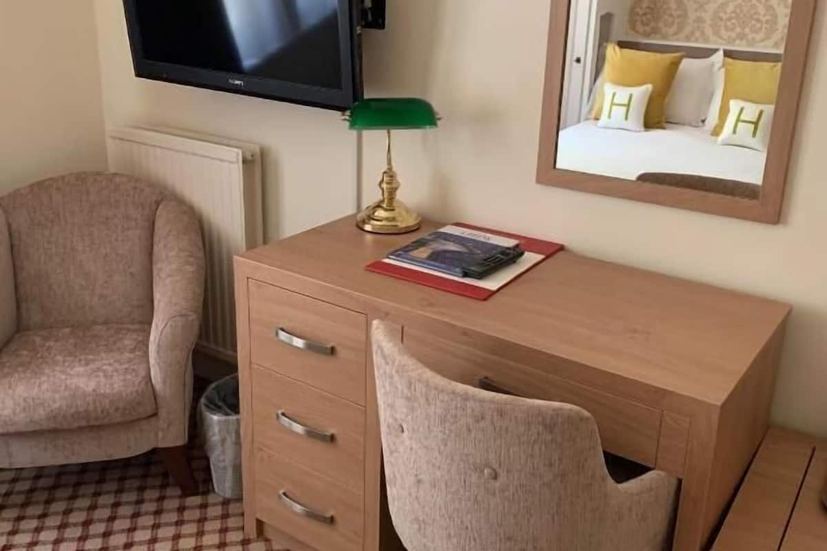 standard room | desk, laptop workspace, blackout curtains, iron/ironing board