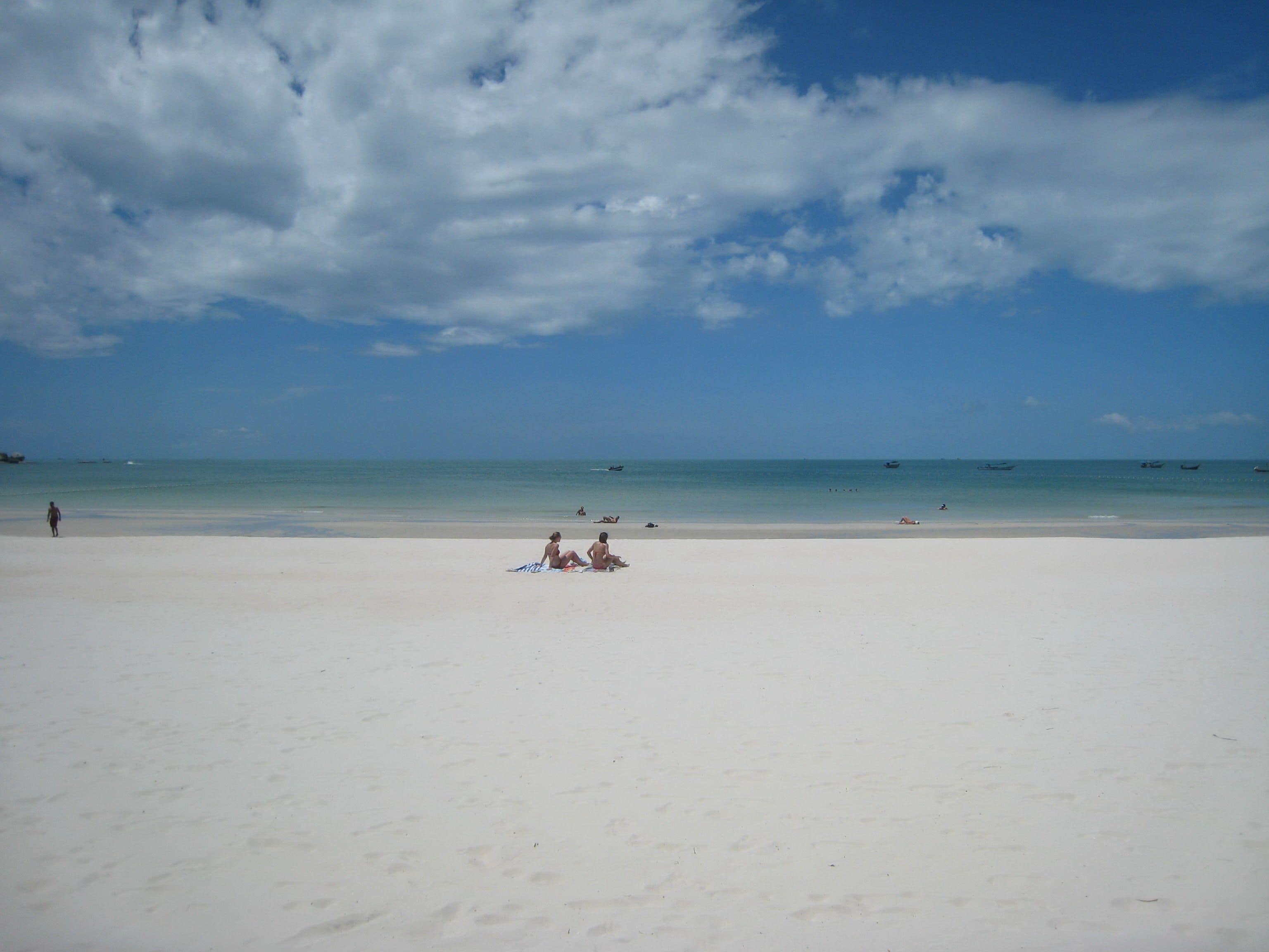 on the beach, beach towels, beach volleyball