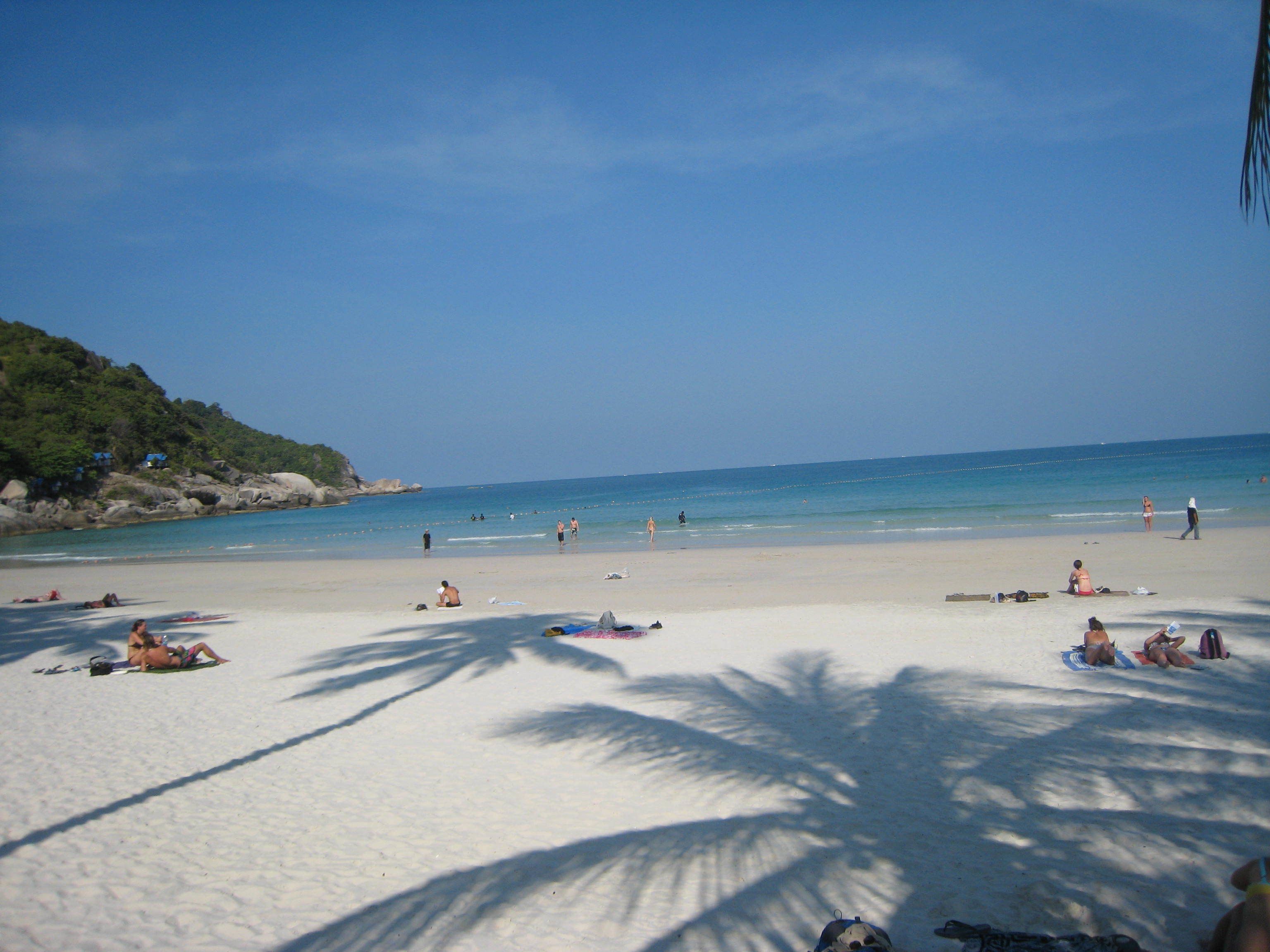 on the beach, beach towels, beach volleyball