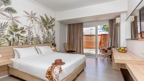 A modern hotel room with a large bed, a desk, and a dining area. - Eurohotel Katrin Hotel & Bungalows (Hersonissos)