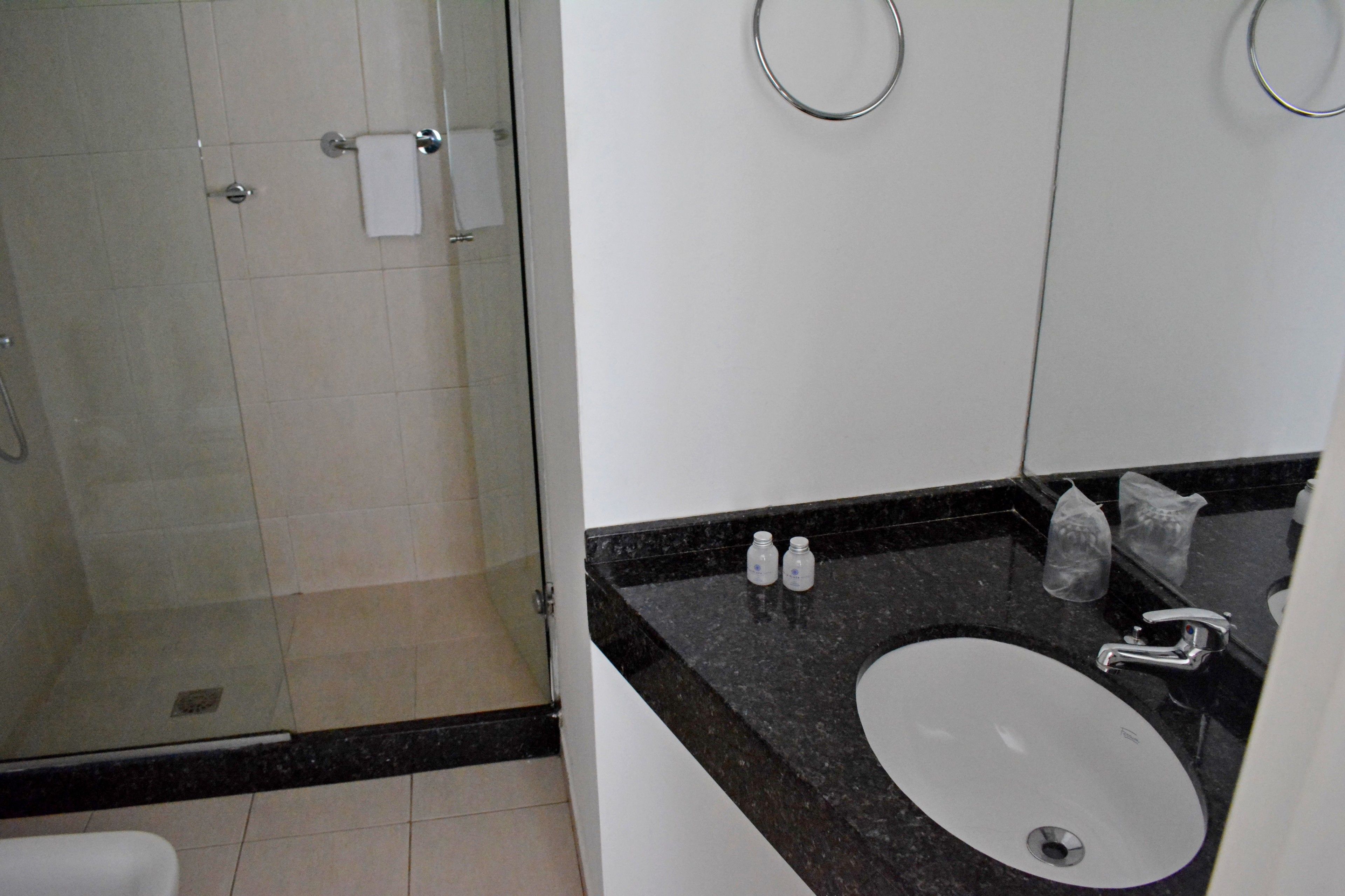 deep-soaking bathtub, rainfall showerhead, free toiletries, hair dryer