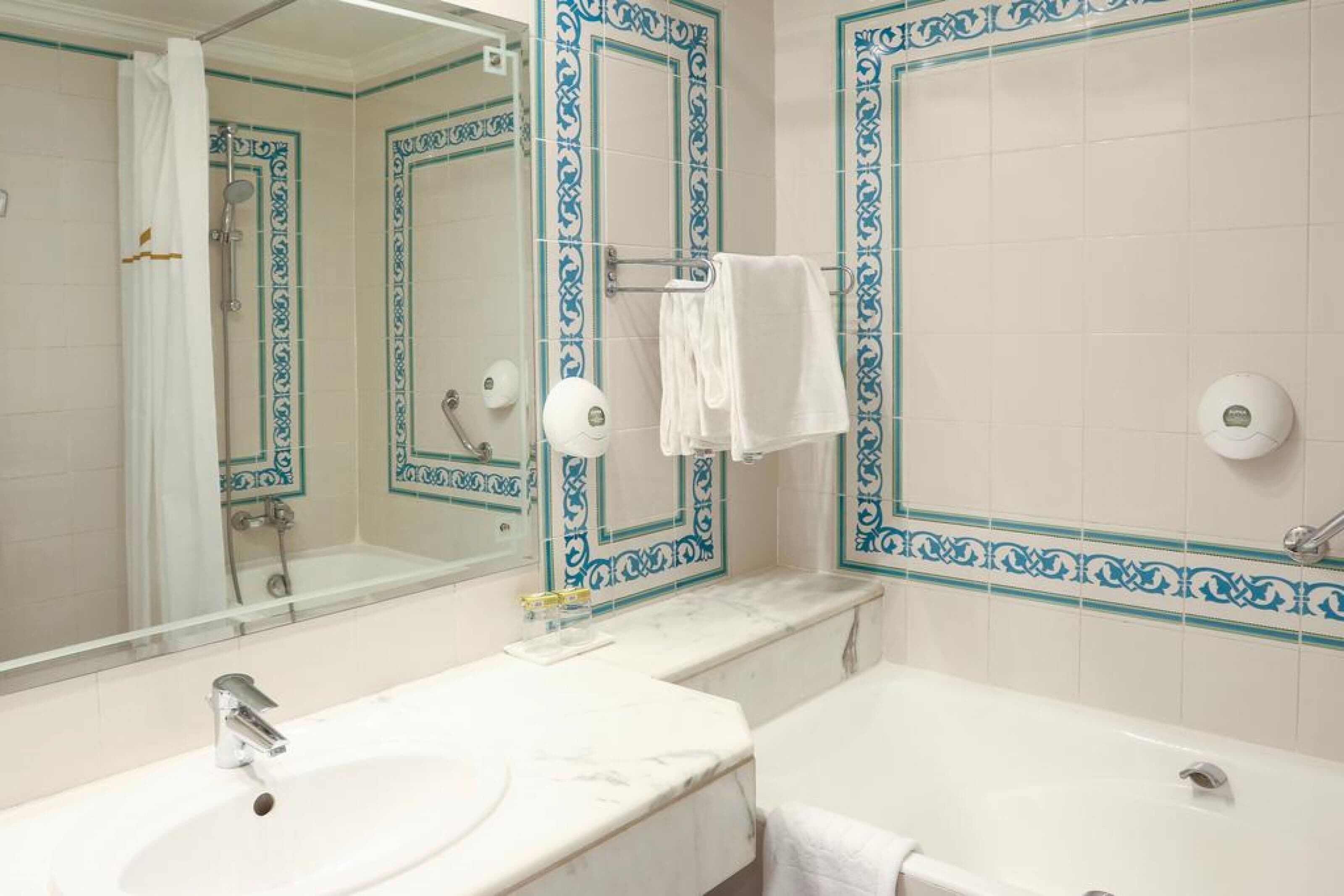 combined shower/bathtub, free toiletries, hair dryer, bathrobes