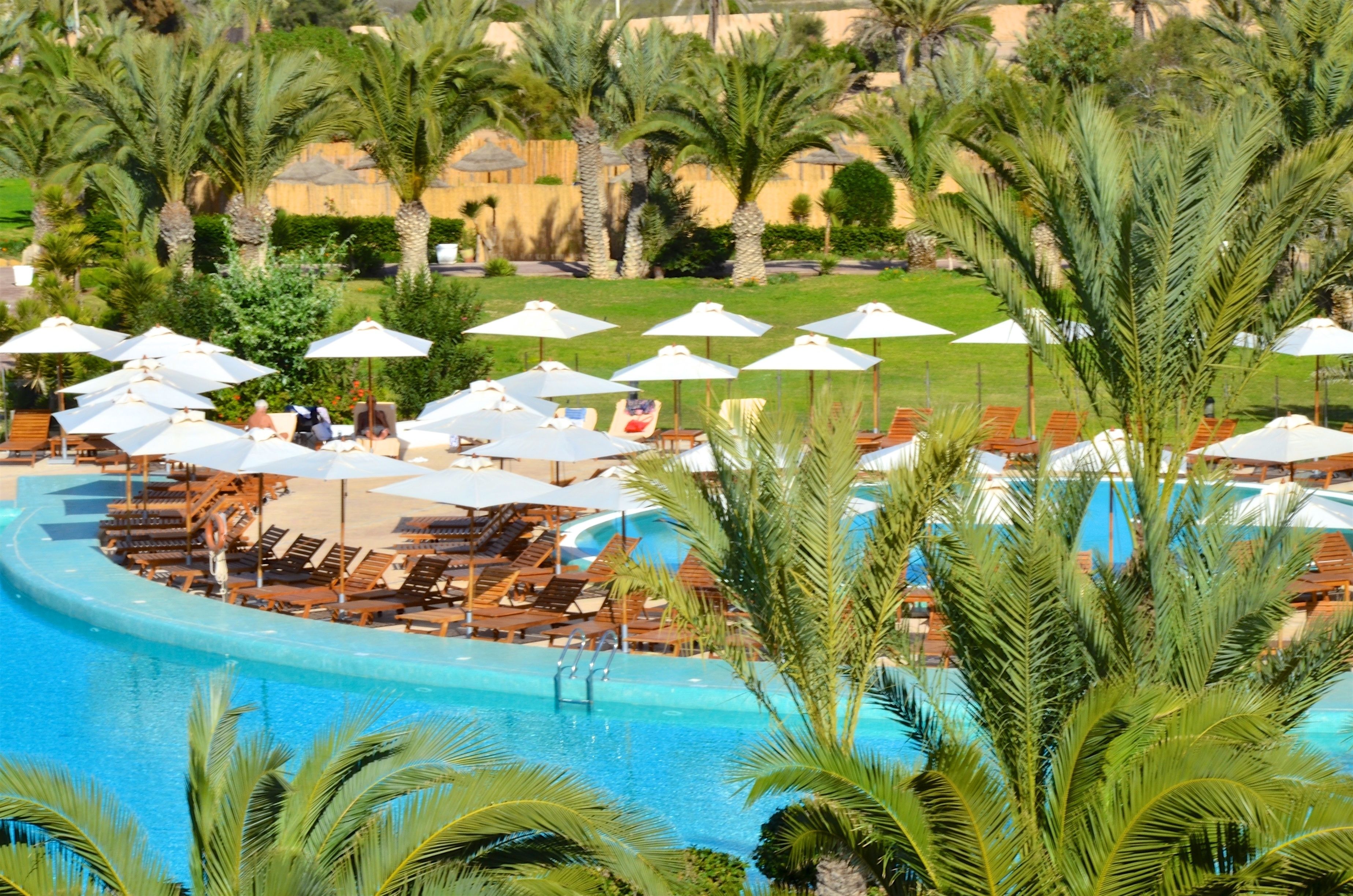 indoor pool, seasonal outdoor pool, pool umbrellas, pool loungers