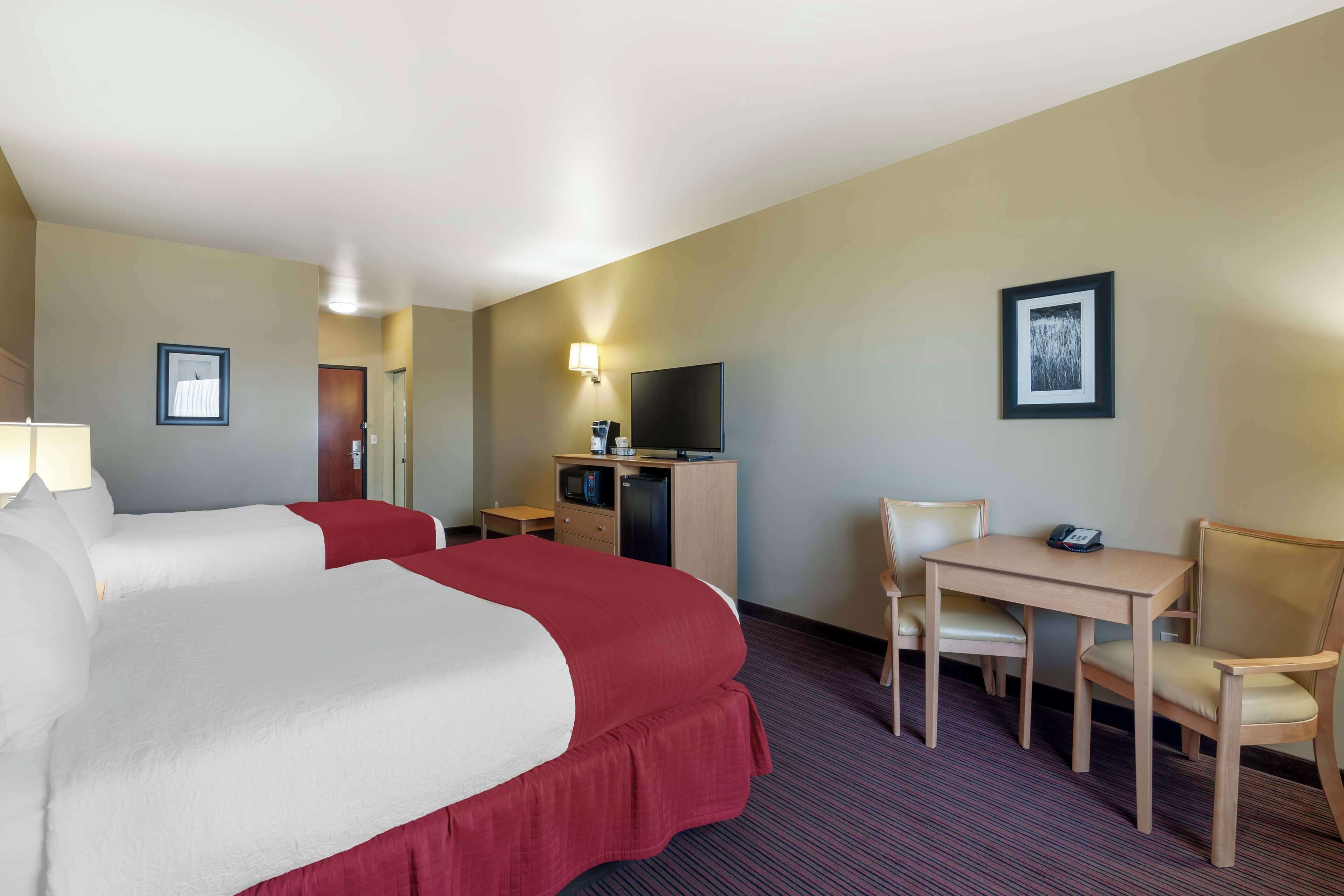 desk, laptop workspace, iron/ironing board, free cots/infant beds