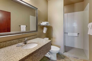 Suite, 1 King Bed, Non Smoking, Refrigerator & Microwave | Bathroom | Free toiletries, hair dryer, towels, soap