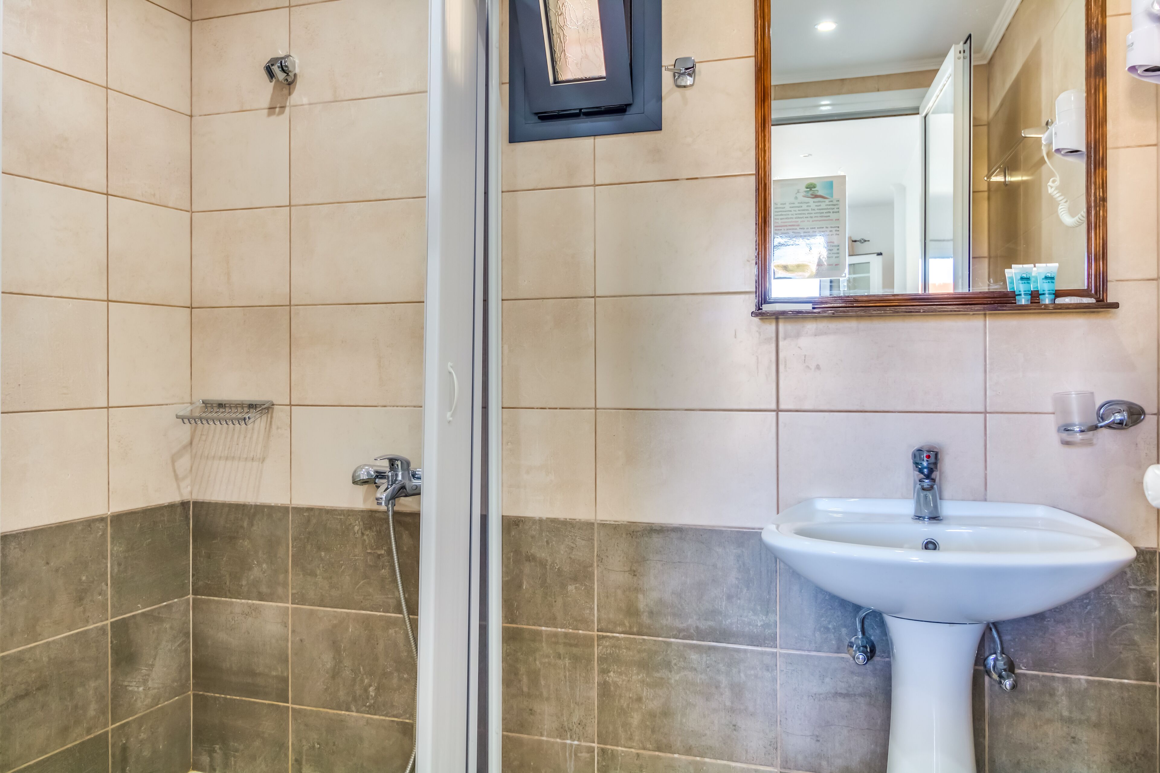 basic triple room | bathroom | shower, free toiletries, hair dryer, towels