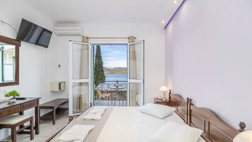 Habitación doble, vista al mar | Caja de seguridad en la habitación y cortinas blackout