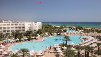 Indoor pool, 2 outdoor pools, open open 24 hours a day, pool umbrellas
