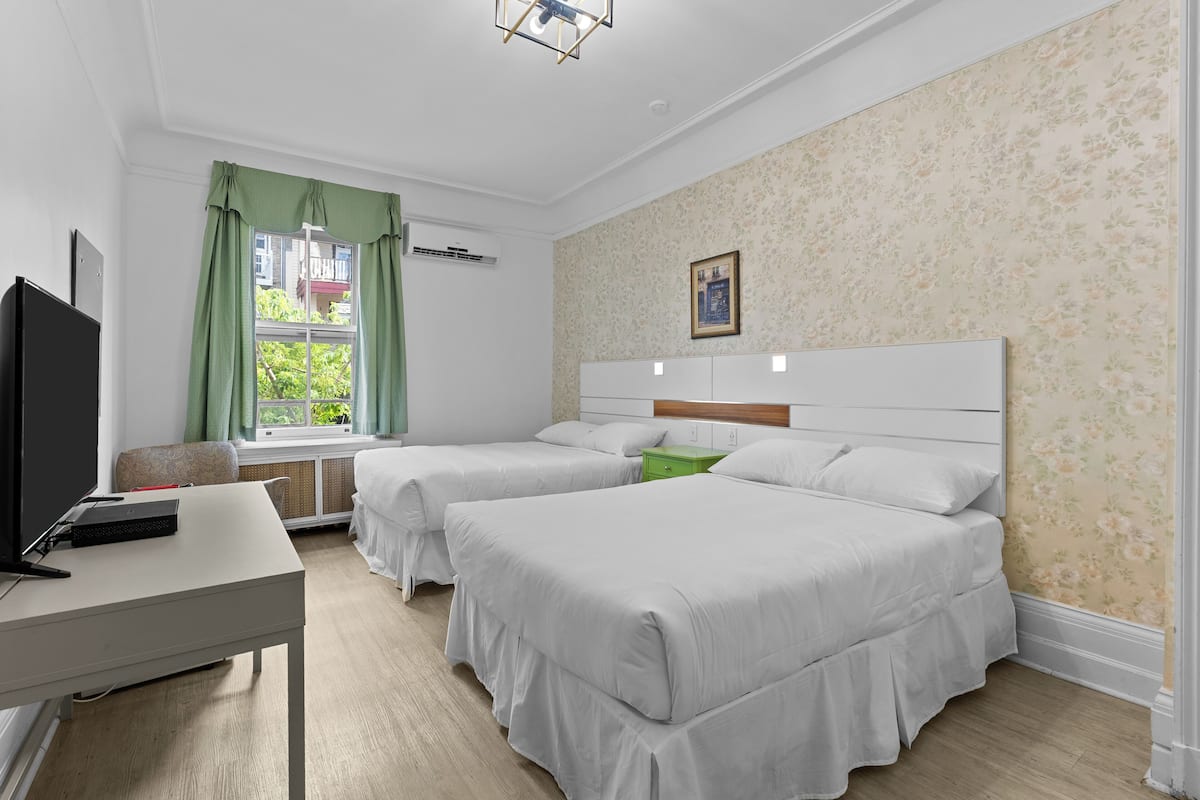 Family Room, 2 Double Beds | Premium bedding, individually decorated, individually furnished