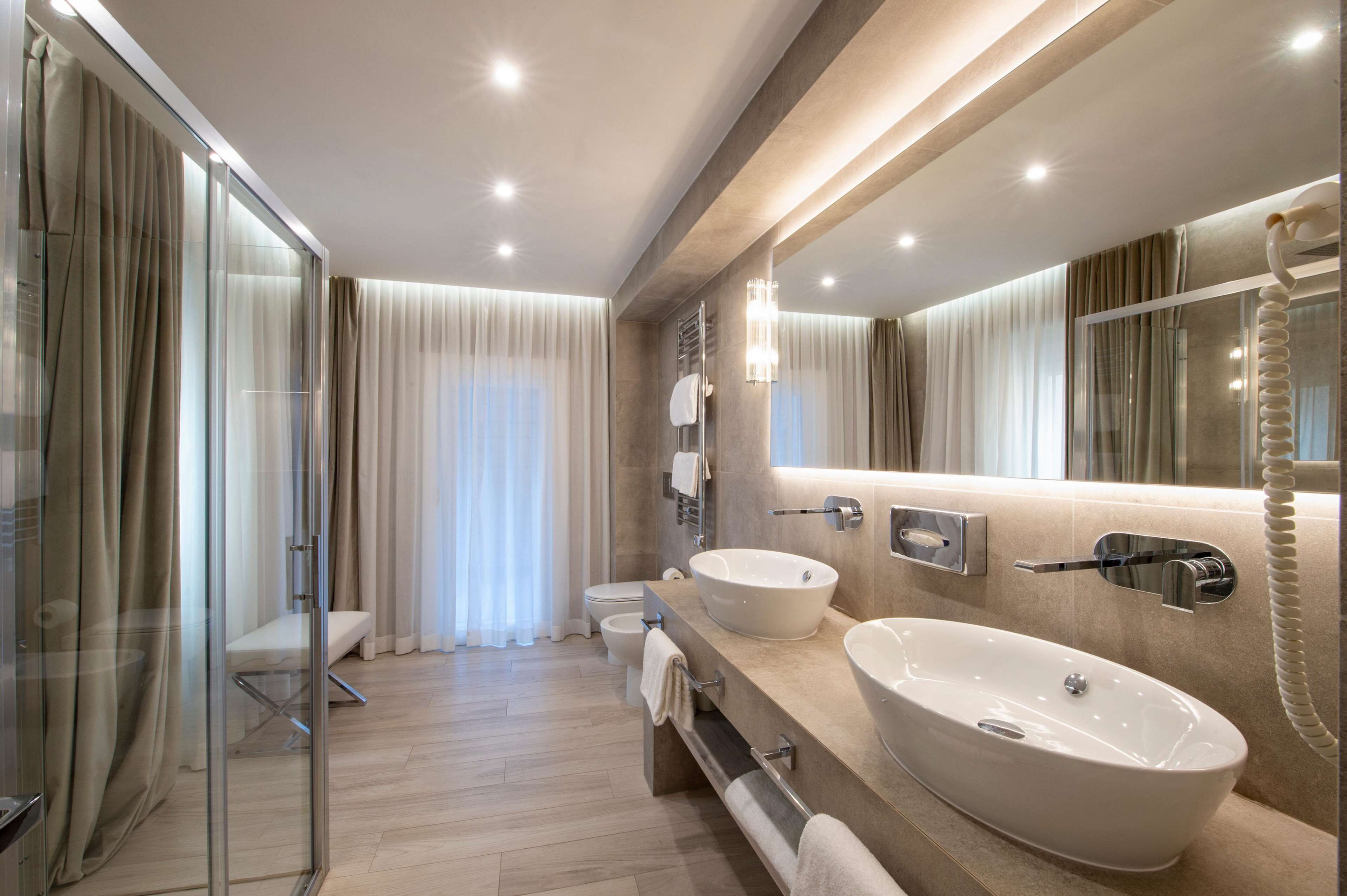 free toiletries, hair dryer, slippers, bidet