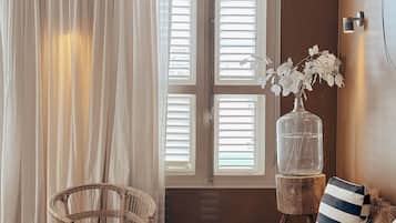 Deluxe Room, City View | Premium bedding, minibar, in-room safe, blackout drapes