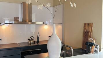 Apartment, 2 Bedrooms, Ocean View | Private kitchen | Mini-fridge, espresso maker, highchair