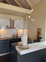 Apartment, 2 Bedrooms, Ocean View | Private kitchen | Mini-fridge, espresso maker, highchair