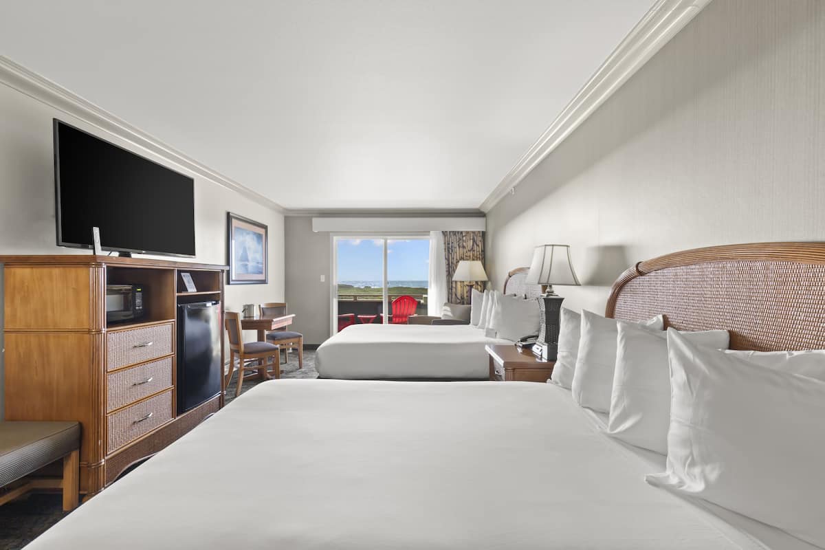 two queen beds, ocean view | hypo-allergenic bedding, desk, laptop workspace, blackout curtains