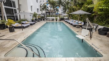 Outdoor pool, pool umbrellas, sun loungers