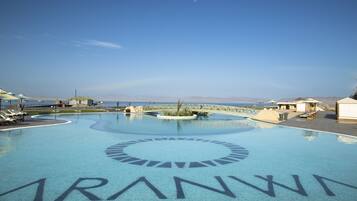 Indoor pool, 2 outdoor pools, open 9:00 AM to 6:00 PM, pool umbrellas