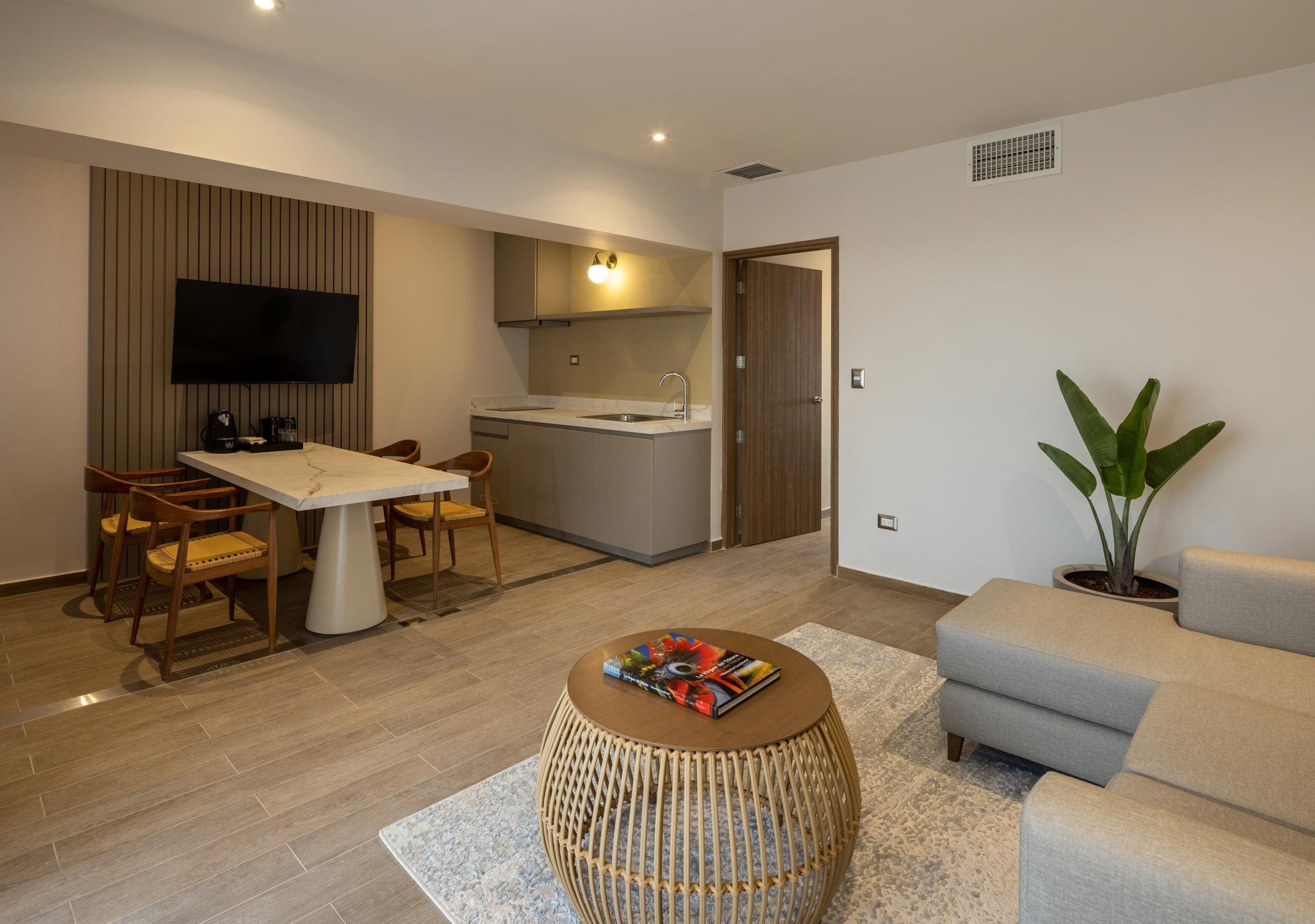 junior suite, 2 queen beds, partial sea view | living area | flat-screen tv