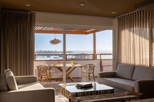 Luxury Suite, 2 Bedrooms | Living area | Flat-screen TV