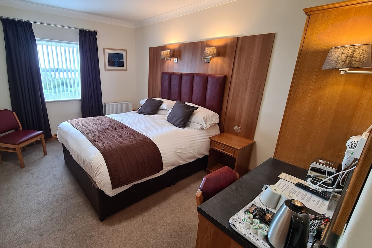 Standard Double Room (with Shower) | 1 bedroom, in-room safe, desk, iron/ironing board