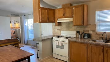 Family Room, 2 Bedrooms, Kitchen (Two Bedrooms) | Private kitchen