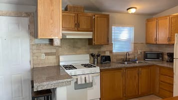 Family Room, 2 Bedrooms, Kitchen (Two Bedrooms) | Private kitchen