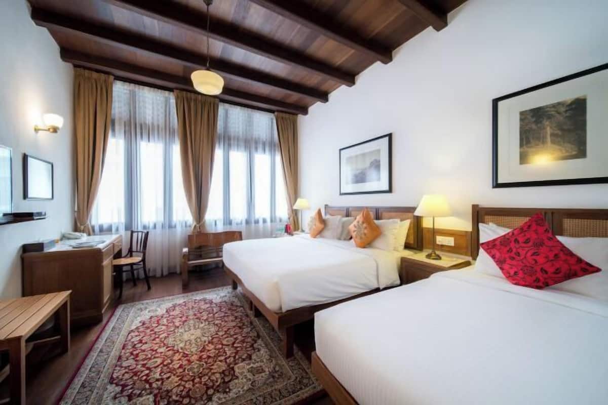 Luxe beddengoed, een minibar, een kluis op de kamer, een bureau