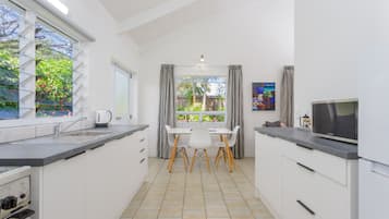 Deluxe Apartment, 1 Bedroom | Private kitchen | Full-size fridge, microwave, stovetop, electric kettle