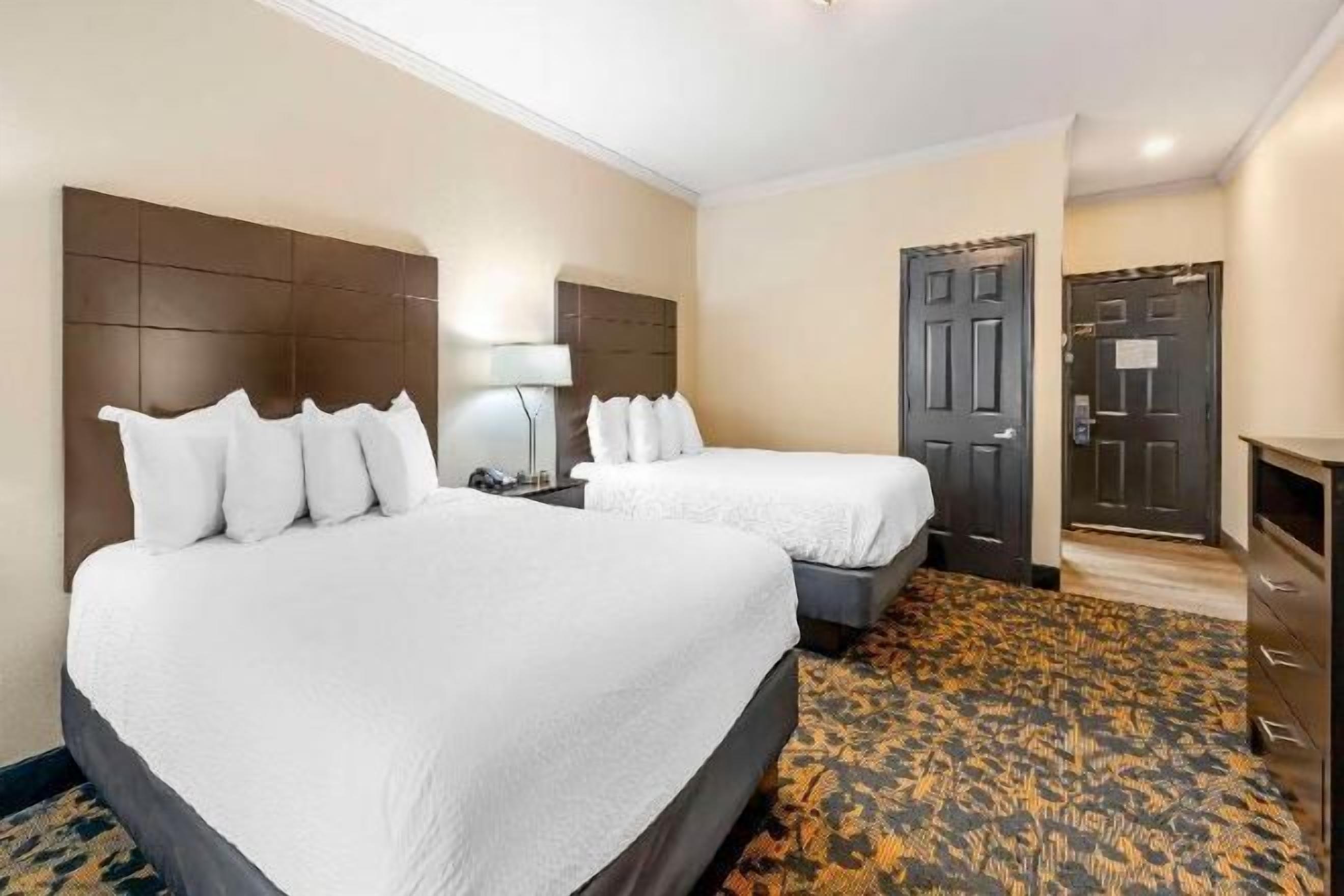 Pillowtop beds, desk, laptop workspace, iron/ironing board