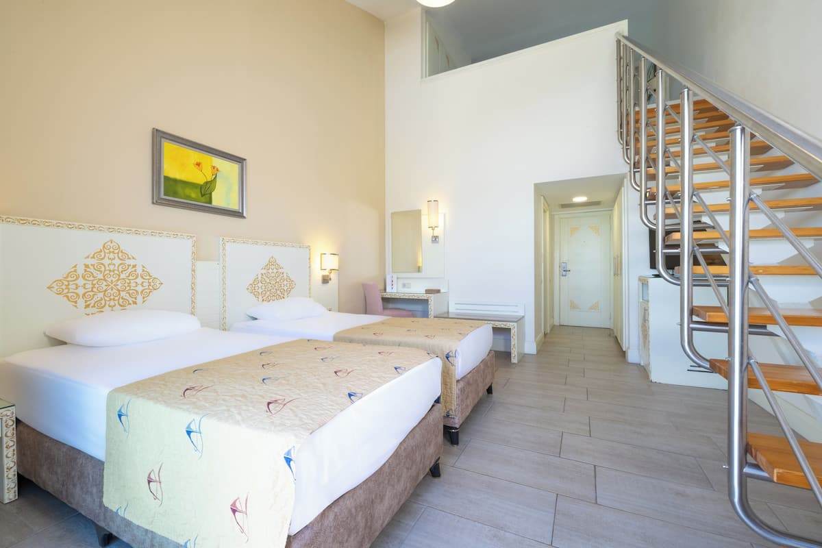 1 Schlafzimmer, hochwertige Bettwaren, kostenlose Minibar, Zimmersafe