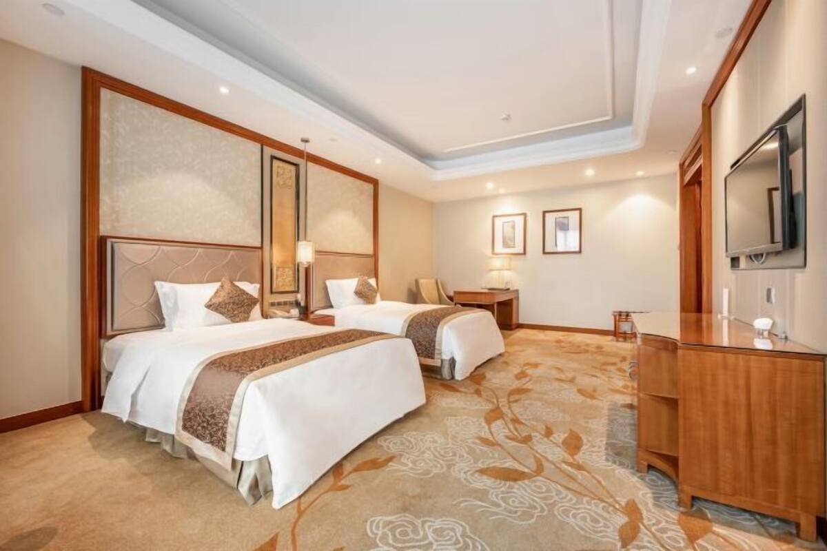 房內夾萬、摺床/加床 (收費)、免費 Wi-Fi