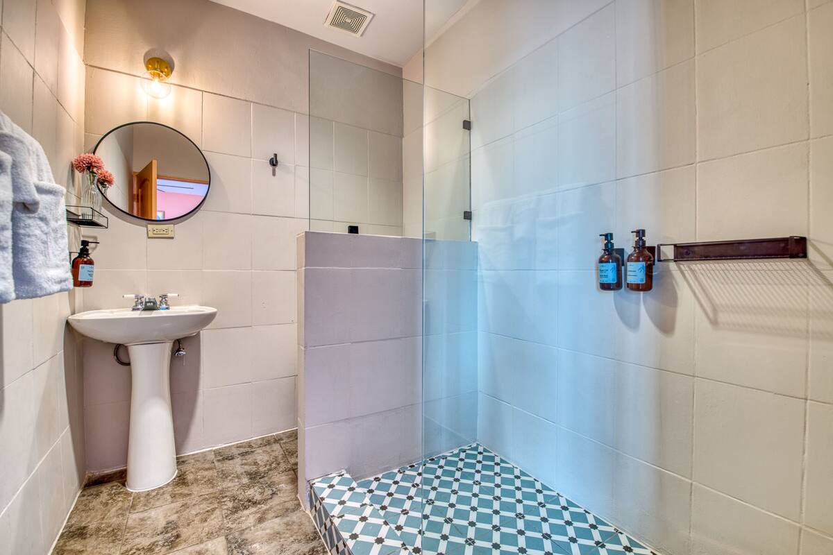 standard twin w/ balcony | bathroom | shower, free toiletries, towels