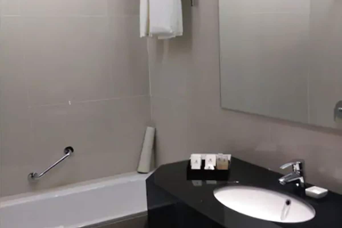 separate bathtub and shower, deep-soaking bathtub, free toiletries