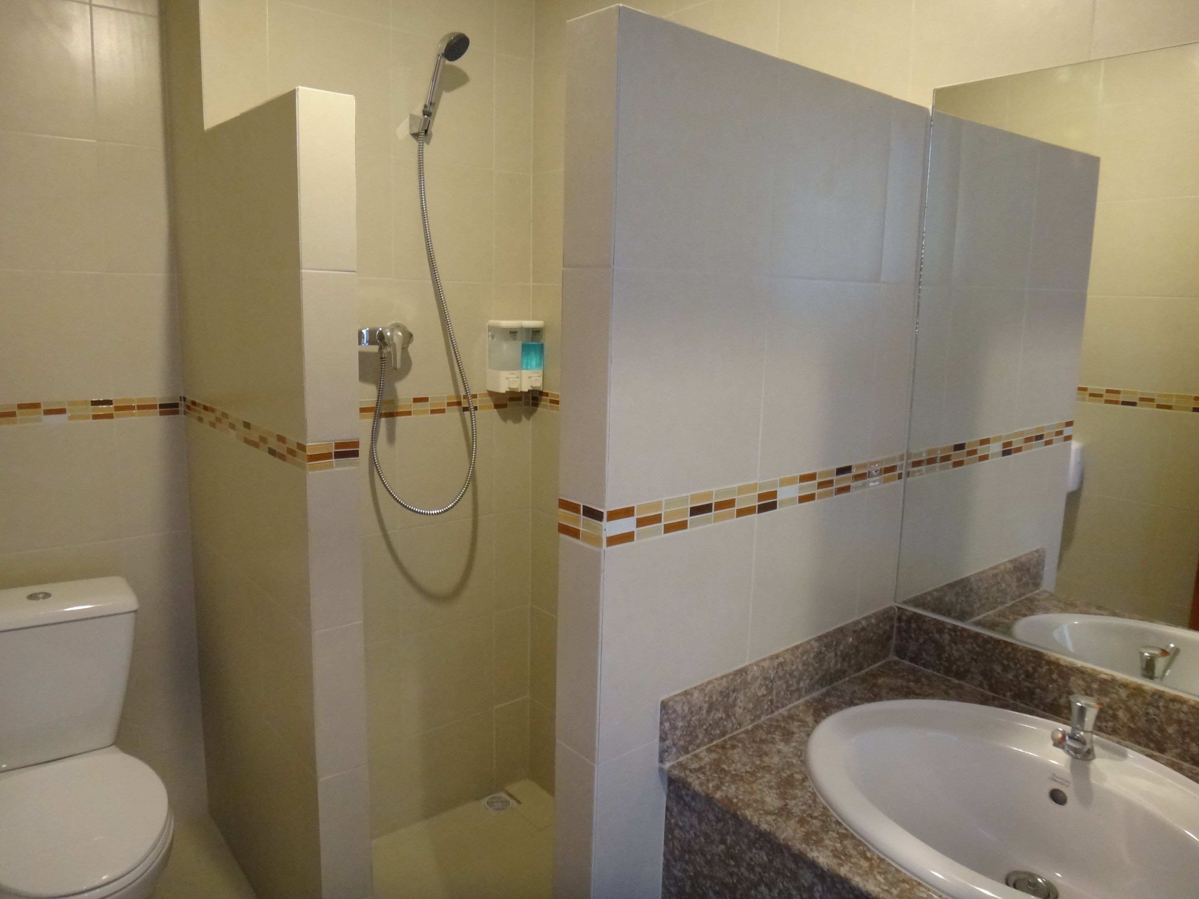 quadruple room  | bathroom | towels