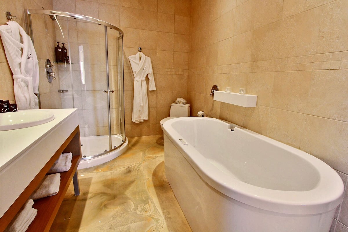 presidential suite, 1 king bed | bathroom | free toiletries, hair dryer, towels, soap