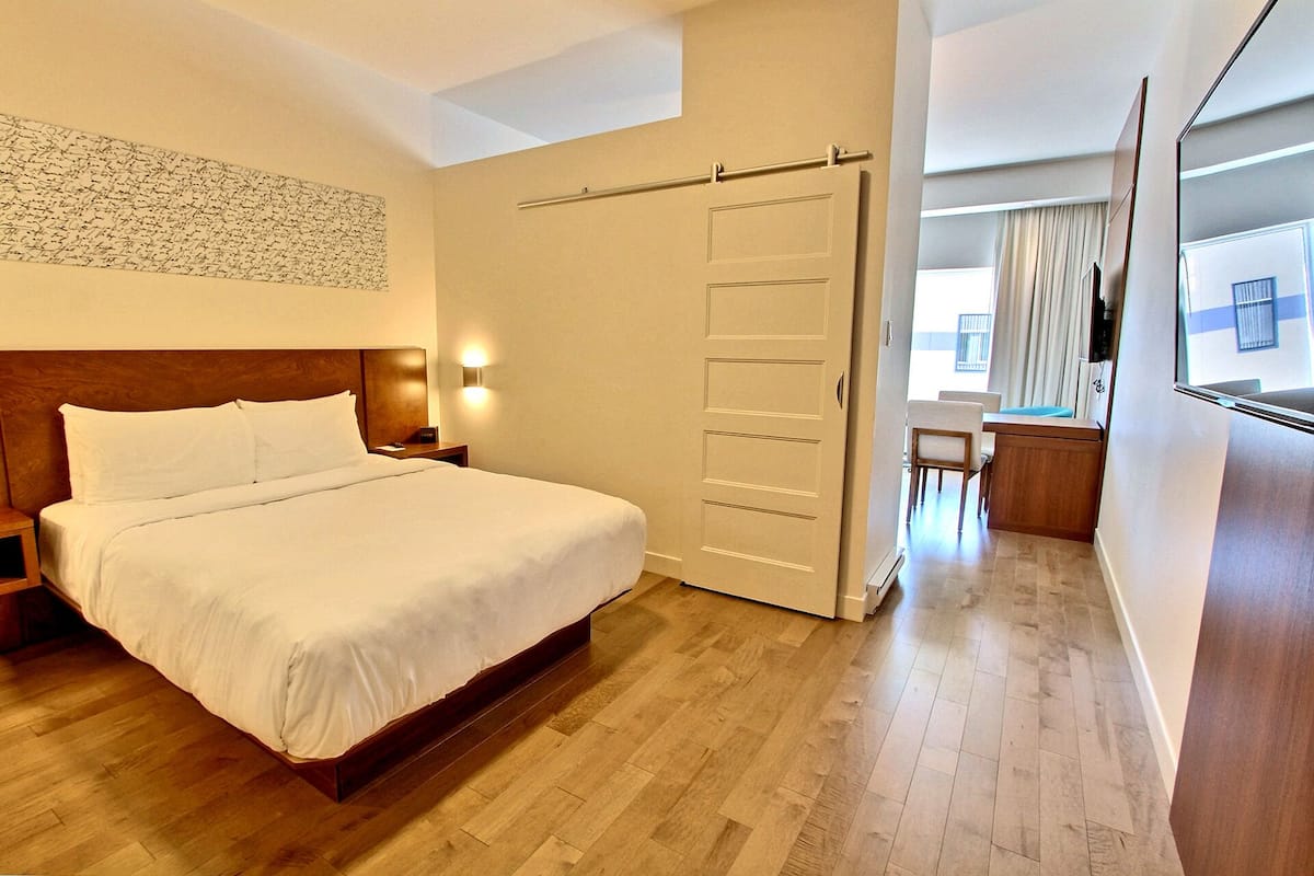 Junior Suite, Multiple Beds | 1 bedroom, premium bedding, desk, blackout curtains
