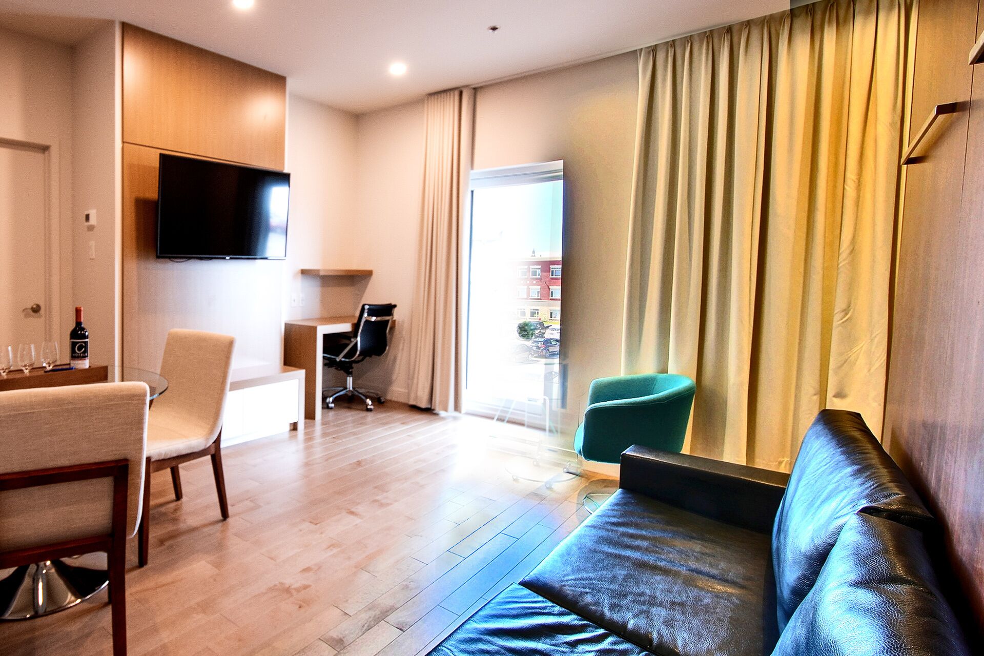 family studio, kitchenette | living area | 52-inch flat-screen tv with cable channels, tv