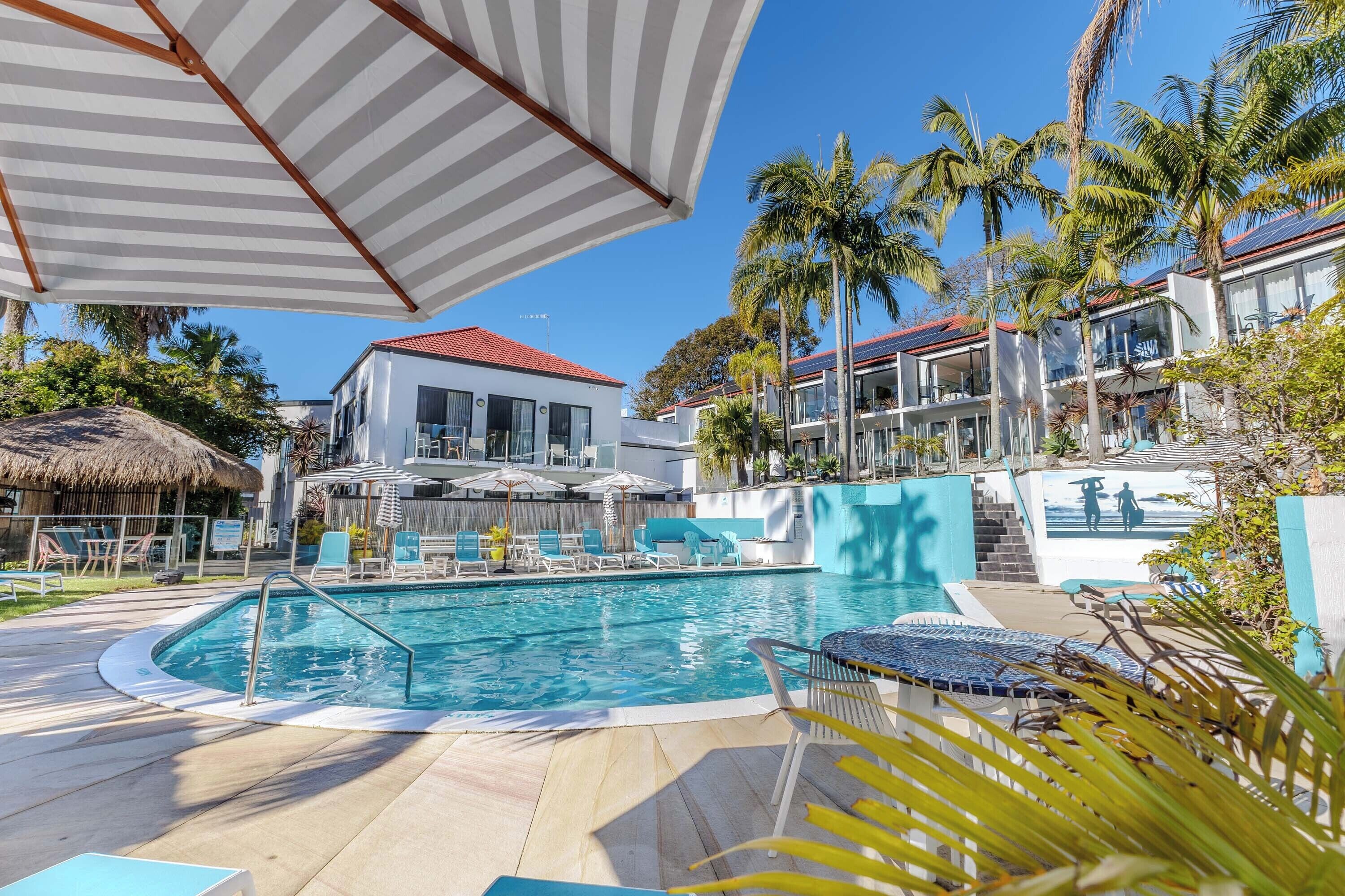 Outdoor pool, a heated pool, open 8:00 AM to 7:00 PM, free pool cabanas