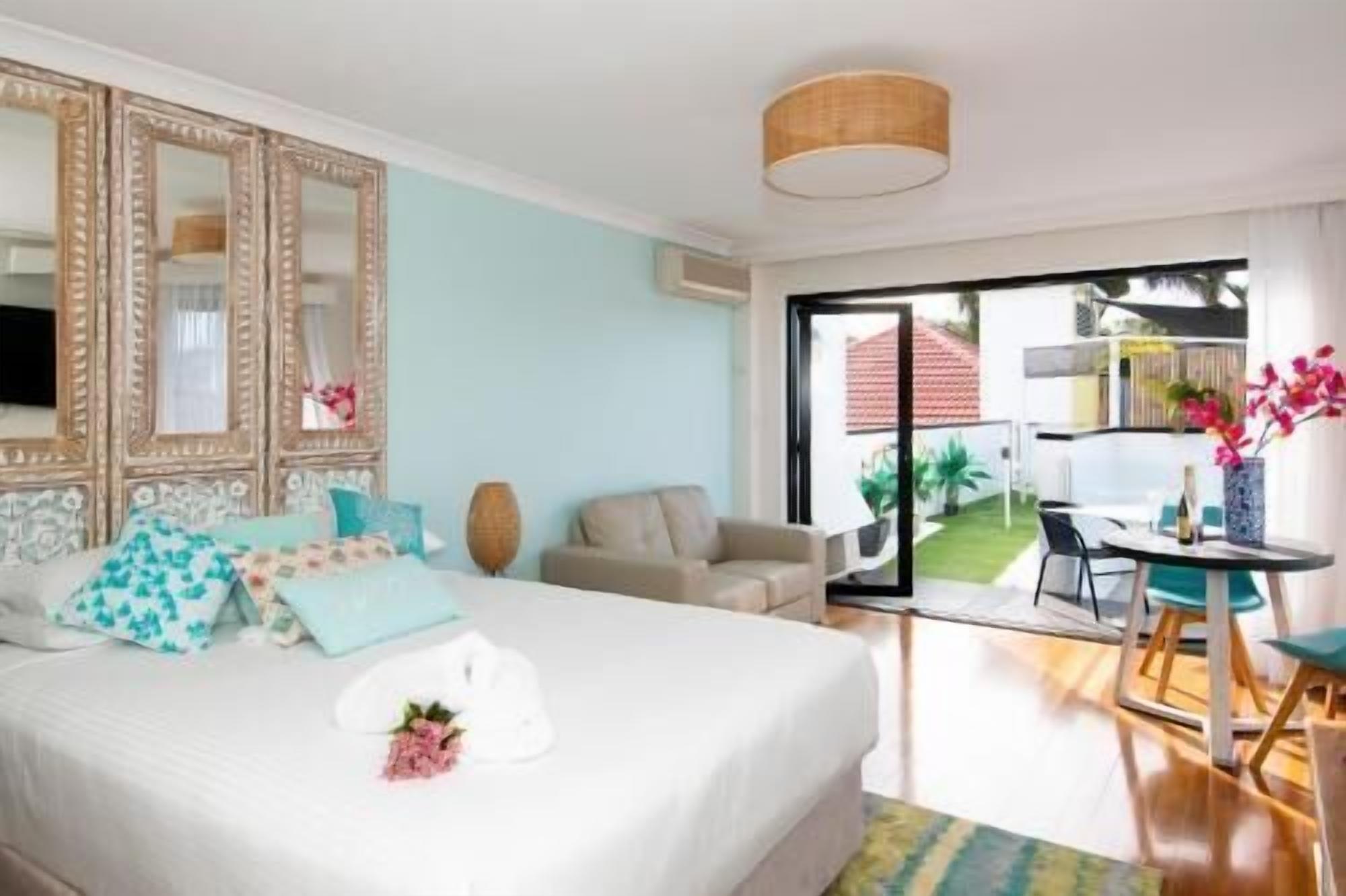 Premium bedding, pillow-top beds, blackout curtains, iron/ironing board