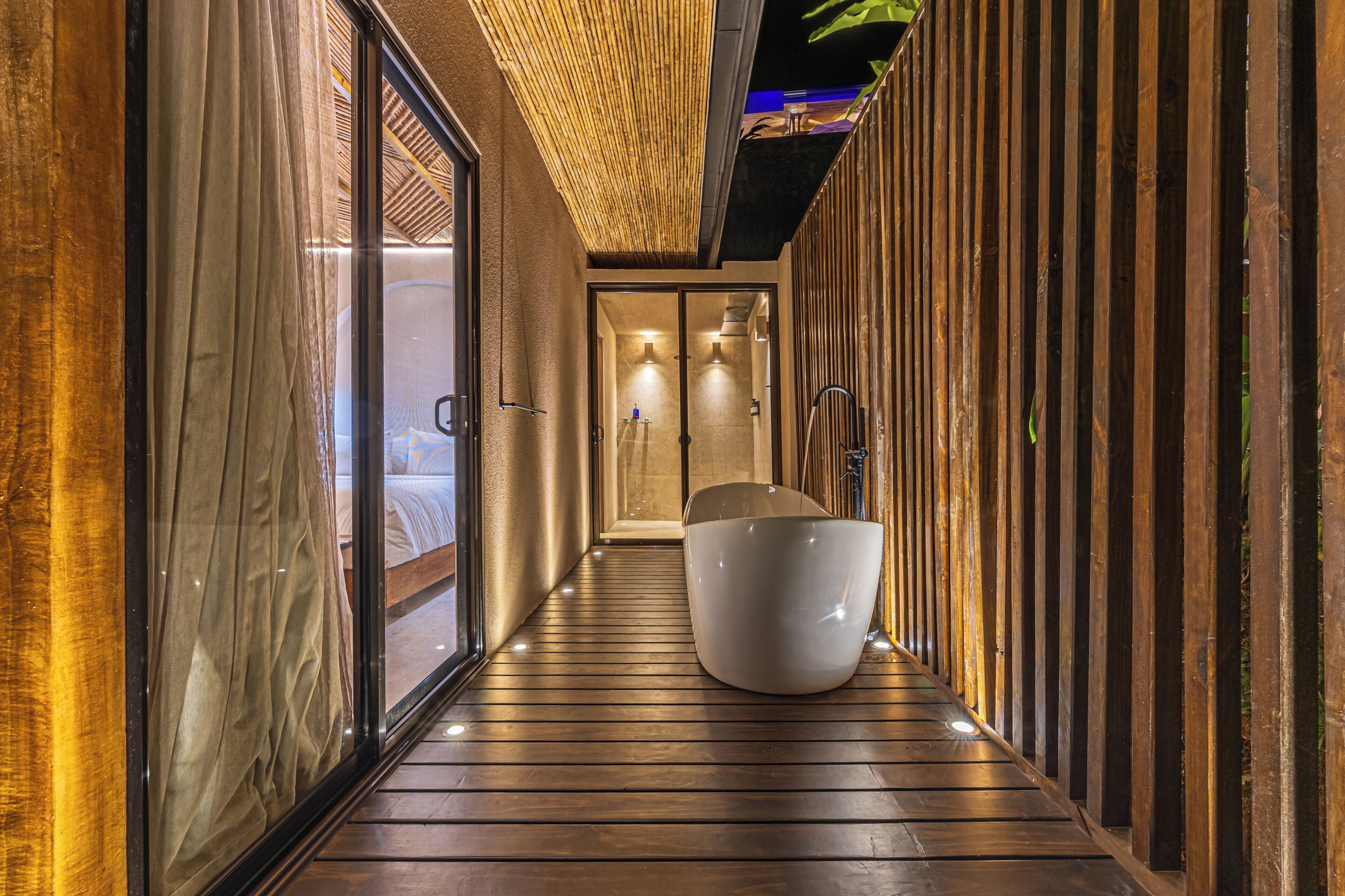 Deluxe villa, 2 queensize bedden, airconditioning, uitzicht op oceaan | Lakens van Egyptisch katoen, pillowtop-bedden, een kluis op de kamer