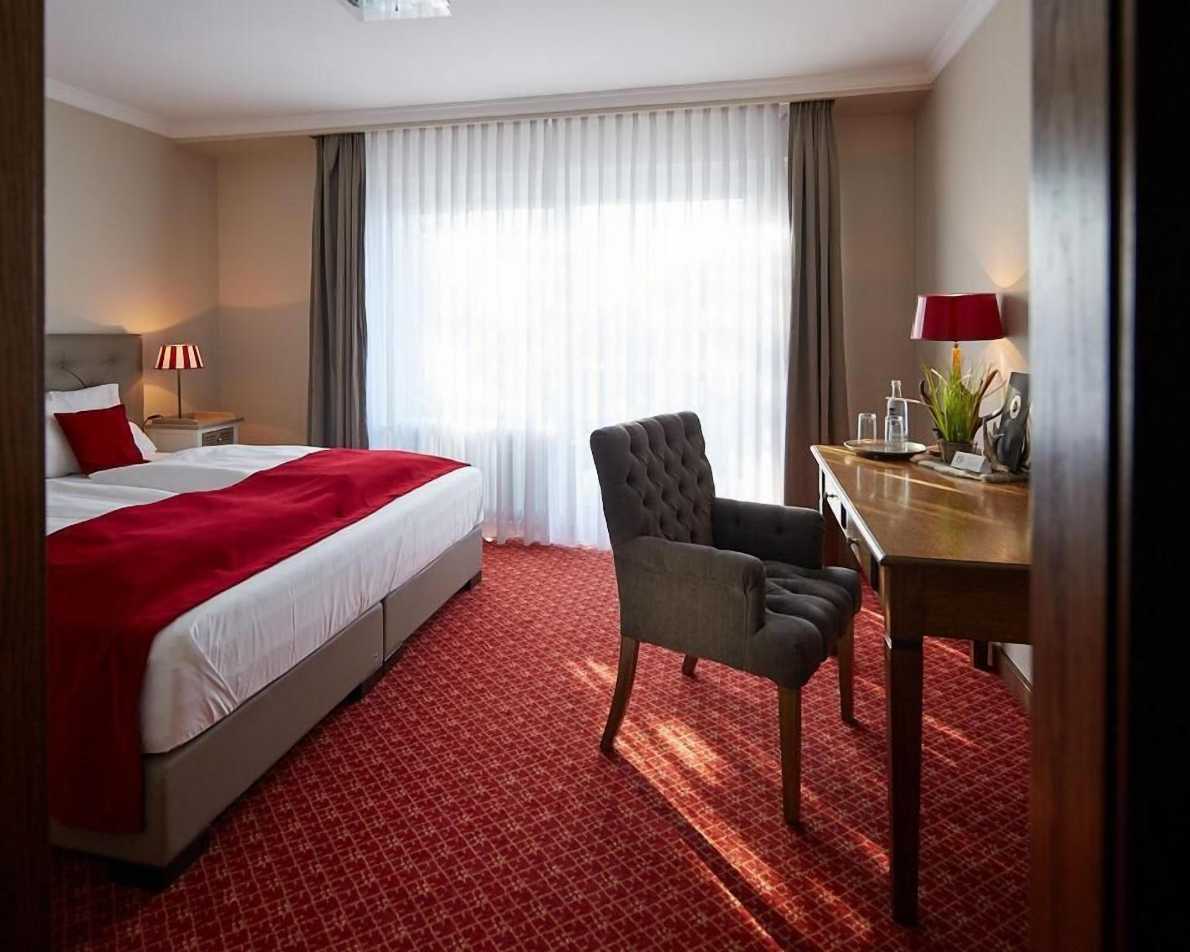 desk, laptop workspace, blackout curtains, iron/ironing board