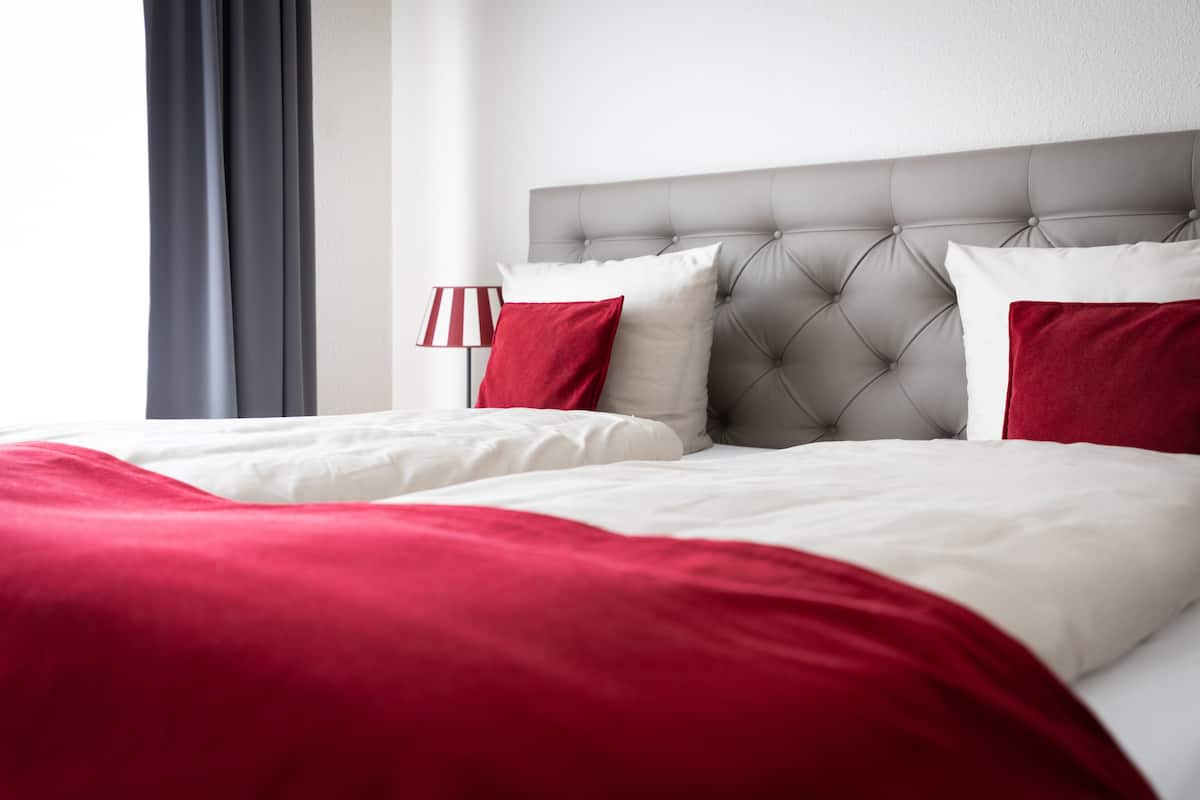 comfort room, 1 bedroom | desk, laptop workspace, blackout curtains, iron/ironing board