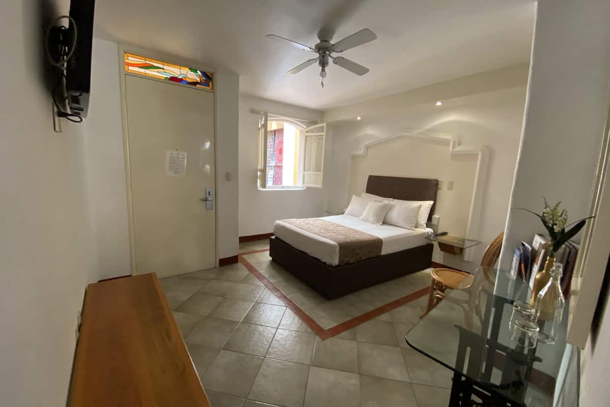 Standard Room, 1 Double Bed | In-room safe, iron/ironing board, free WiFi, bed sheets
