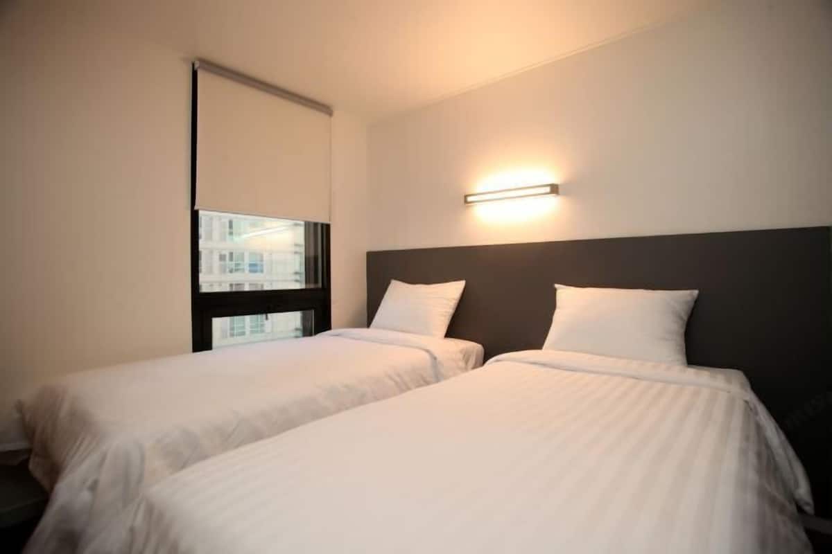 Blackout drapes, WiFi (free), bed sheets