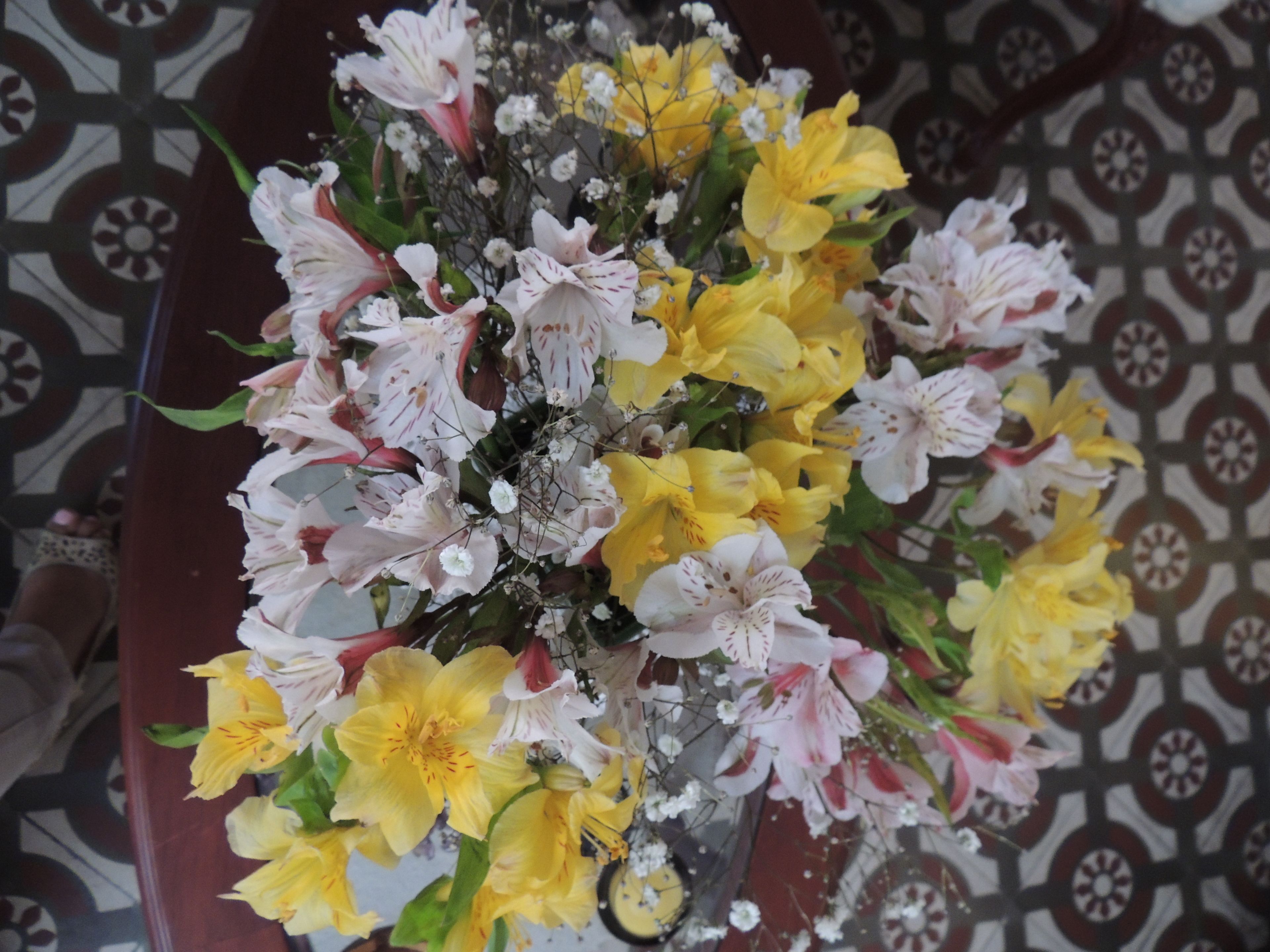 A bouquet of flowers in a vase.