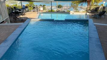 Outdoor pool, open 7:00 AM to 9:00 PM, sun loungers