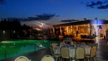 Outdoor pool, open 10 AM to 7 PM, pool umbrellas, pool loungers