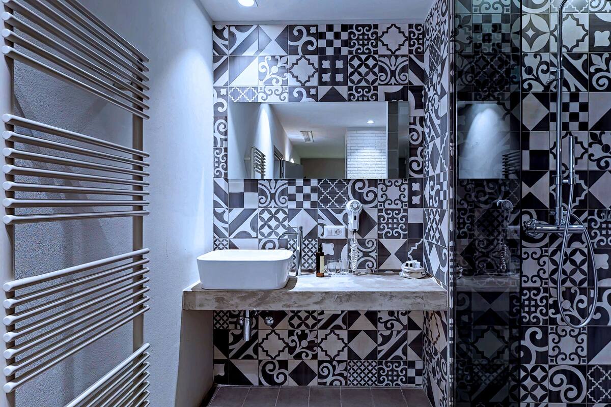 shower, rainfall showerhead, designer toiletries, hair dryer