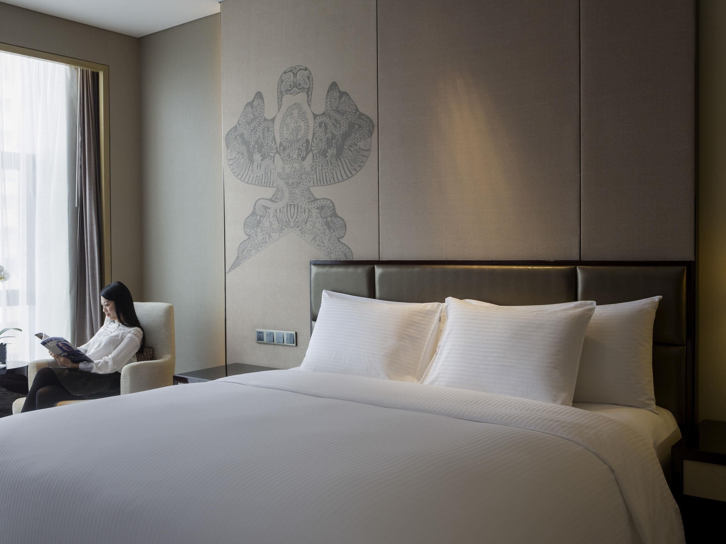 Ropa de cama de alta calidad y minibar 
