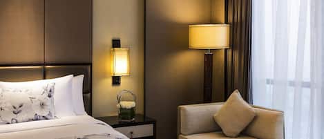 Suite, 1 King Bed | 1 bedroom, premium bedding, minibar, in-room safe